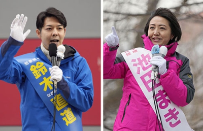 写真：道知事選が告示され、第一声を上げる鈴木直道氏（左）と池田真紀氏＝２３日午前、札幌市