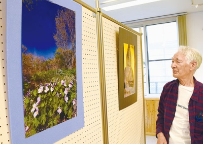 写真：のぼりんで開かれている土屋さんの写真展