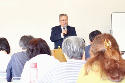 写真：大塚さんが説明した「所得税・個人住民税の定額減税」に関する説明会