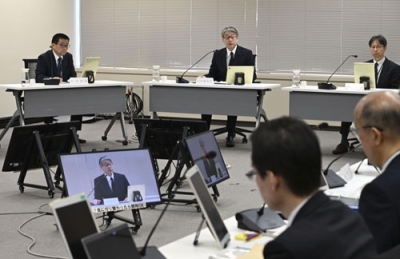 写真：北電泊原発３号機について議論する原子力規制委の会合＝３０日午前、東京都港区