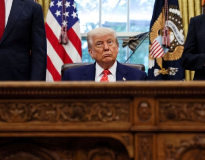 写真：英国との貿易合意に関して米ホワイトハウスで記者会見するトランプ大統領＝８日、ワシントン（ロイター＝共同）