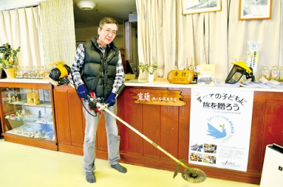 写真：多くの参加を呼びかける藤当リーダー