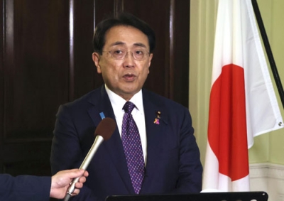 写真：日米の閣僚交渉を終え、取材に応じる赤沢経済再生相＝３０日、ワシントン（共同）