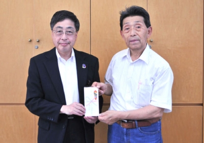 写真：斉藤実行委員長（右）、髙木事務局長