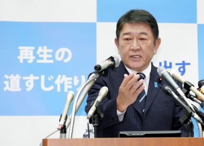 写真：記者会見で、自民党総裁選への立候補を正式に表明する茂木前幹事長＝１０日午後、国会