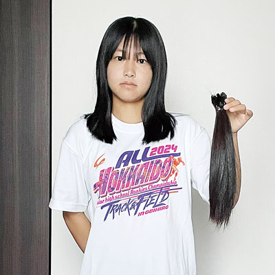 写真：ヘアドネーションに協力した田中さん