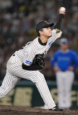 写真：力投する阪神・高橋＝甲子園