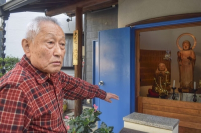 写真：自治会長を務める菅利秋さん＝２０２５年１１月、神戸市長田区