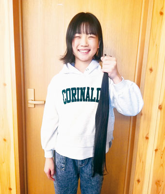 写真：ヘアドネーション活動に協力した島崎さん